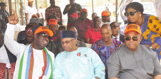 Edo State Governor, Mr. Godwin Obaseki (left); with the Minister of State for Health, Dr. Osagie Ehanire (middle), during the governor's ward-to-ward campaign in Oredo Local Government Area, Edo State.