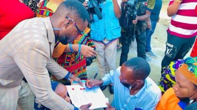 OPM Pastor presents gifts to the parents