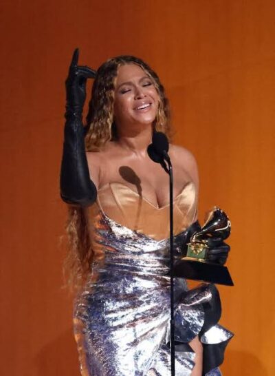 Beyonce holding Grammy Award