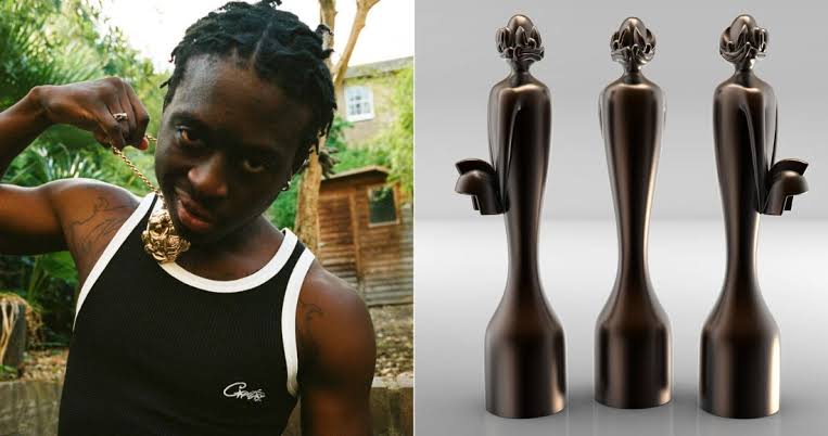 Slawn with Brit Awards Statuette