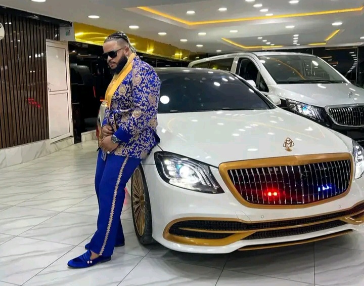 Whitemoney posing with his newly acquired car