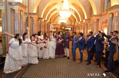 Couple with both bridesmaids and groomsmen 