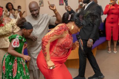 Lady Vivian Irondi dancing and being cheered by well wishers 