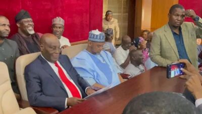 Atiku Abubakar flanked by Dino Melaye 