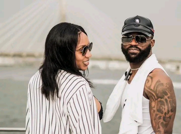 Iyanya with a female fan who admired him at Davido's timeless concert in Lagos