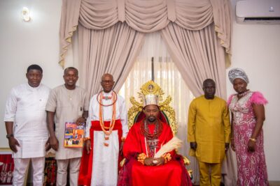 L-R  Sam, Excel Publisher,  Warri's Chief, Olu of Warri, EBENCO and Wife