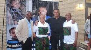 CEO of Excel Global Media, Boniface Ihiasota with the celebrant and his parents