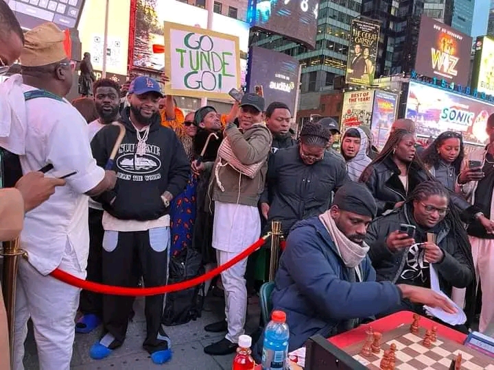 Chess Master Tunde Onakoya Receives Davido's Support at Times Square